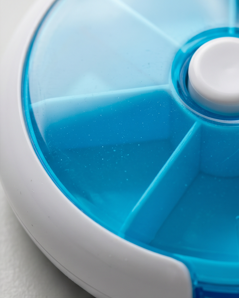 Porta Comprimidos com 7 Compartimentos Giratório | Azul